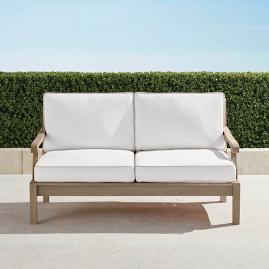 Cassara Loveseat with Cushions in Weathered Finish