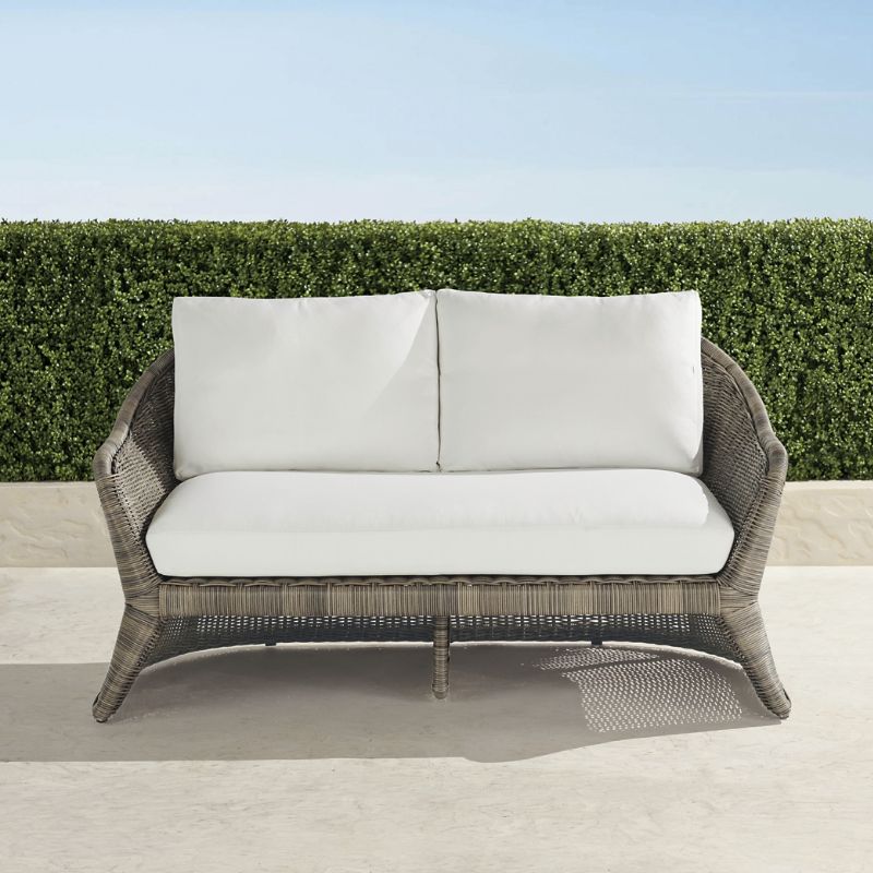 FRONTGATE TERRACE PARK LOVESEAT WITH CUSHIONS IN DESERT WICKER 